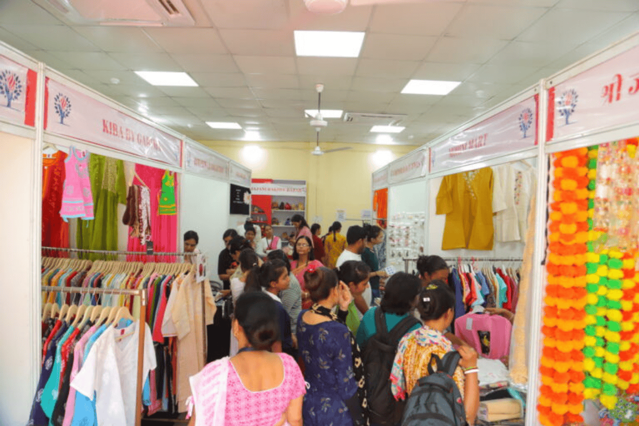 Students showcasing handcrafted and fashion design items during Udaan exhibition in Mathura