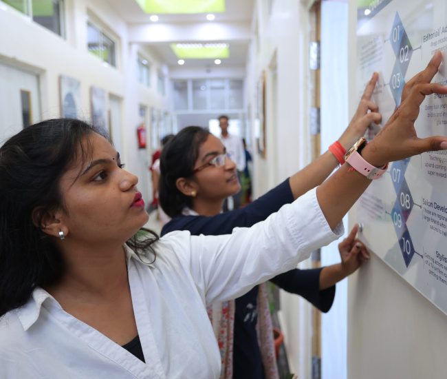 Female students at SDTT Vocational Institute receiving scholarship assistance in Mathura.
